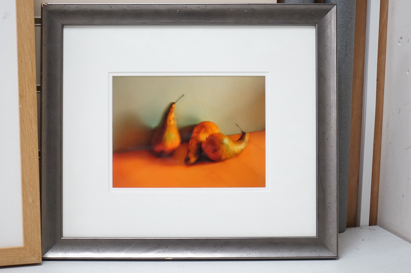Valda Bailey (contemporary), Still life’s of fruit and flowers, one titled ‘Rainbow’, the other signed and numbered in ink, two photographic prints, largest 32 x 47cm